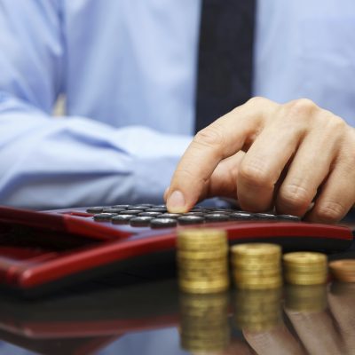 businessman calculating growing savings,