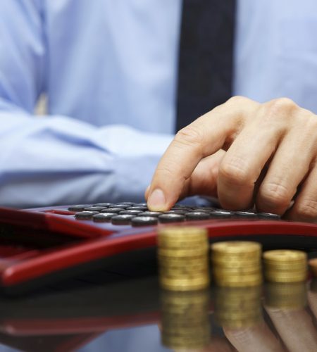 businessman calculating growing savings,